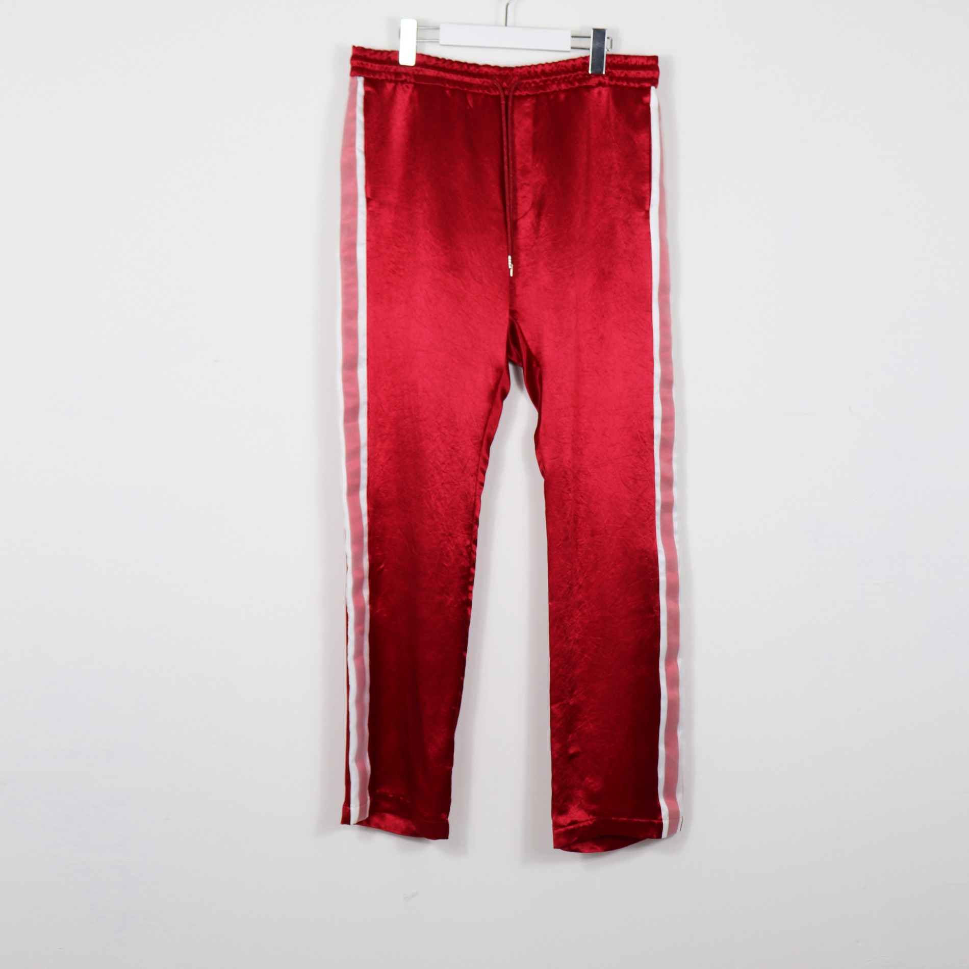 NEONSIGN ACETATE SATIN TRACK PANTS RUBY